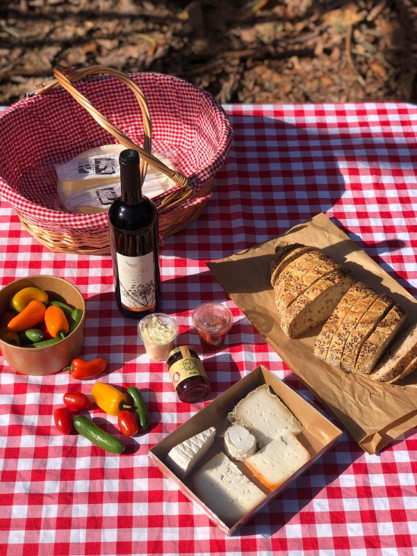 Open Picnic Basket for two with Galil Mountain winery wine Hanan Hagaban